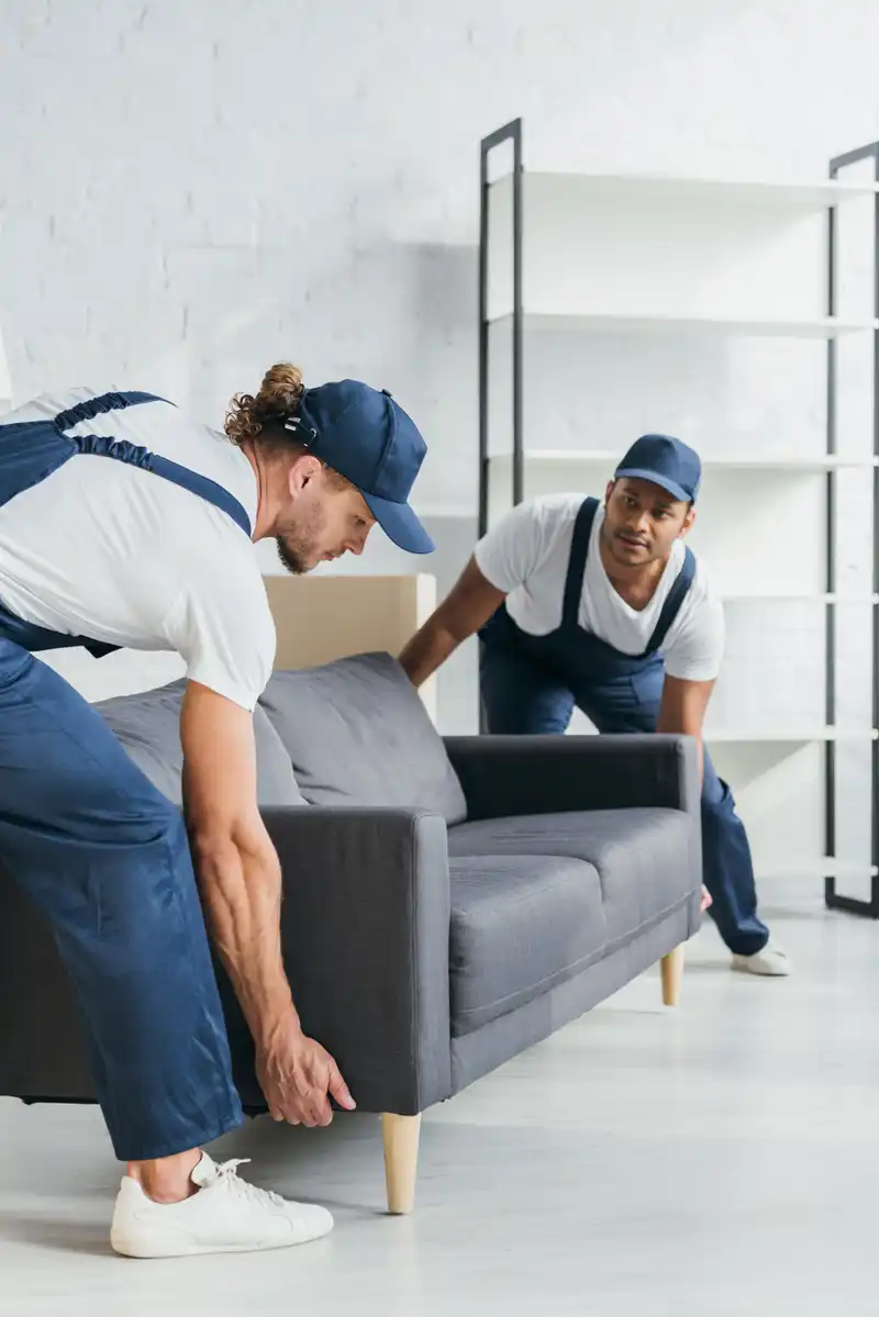 Delivery guys delivering a sofa